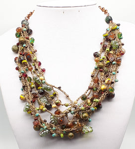 Statement crochet necklace full of different glass Czech beads and  Picasso Japanese seed beads. 