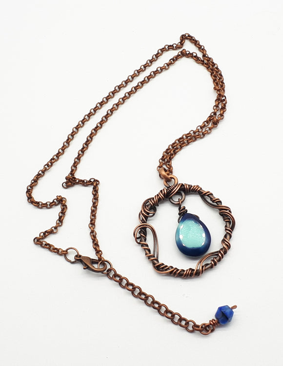 Copper wire wrapped pendant necklace with blue Czech bead