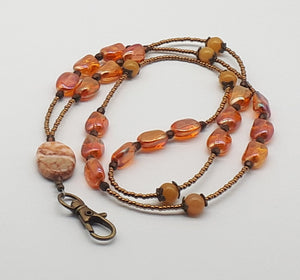 Orange beaded lanyard necklace