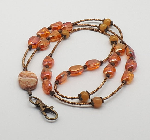 Orange beaded lanyard necklace