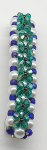 Teal, purple and blue  beaded flower pattern hair barrette on a white pearl base