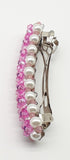 Pink  and purple beaded flower pattern hair barrette on a white pearl base