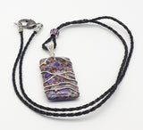 Purple sediment jasper leather necklace.