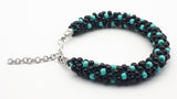 Black and turquoise Kumihimo beaded bracelet