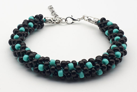 Black and turquoise Kumihimo beaded bracelet