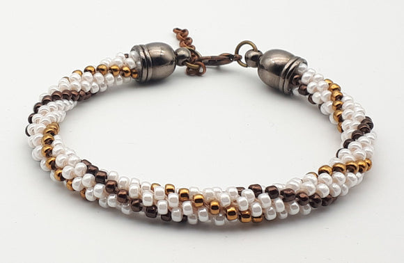 Metallic colors and white Kumihimo beaded bracelet