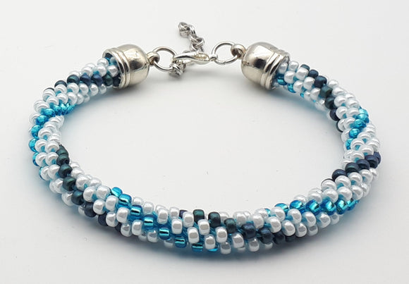 Blue and white Kumihimo beaded bracelet