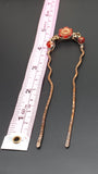 Red wild rose copper hair fork